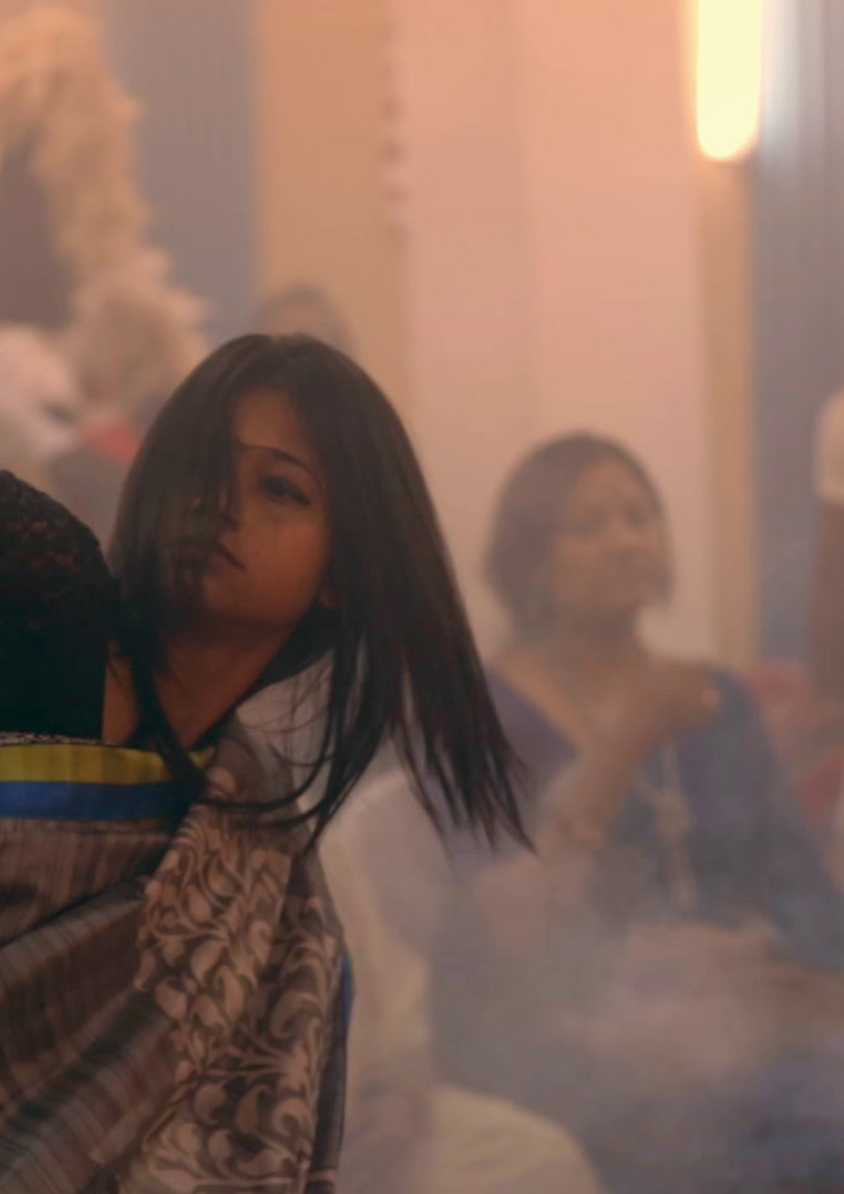 Woman in a crowd amid smoke, Lifebuoy · Germ Nashini